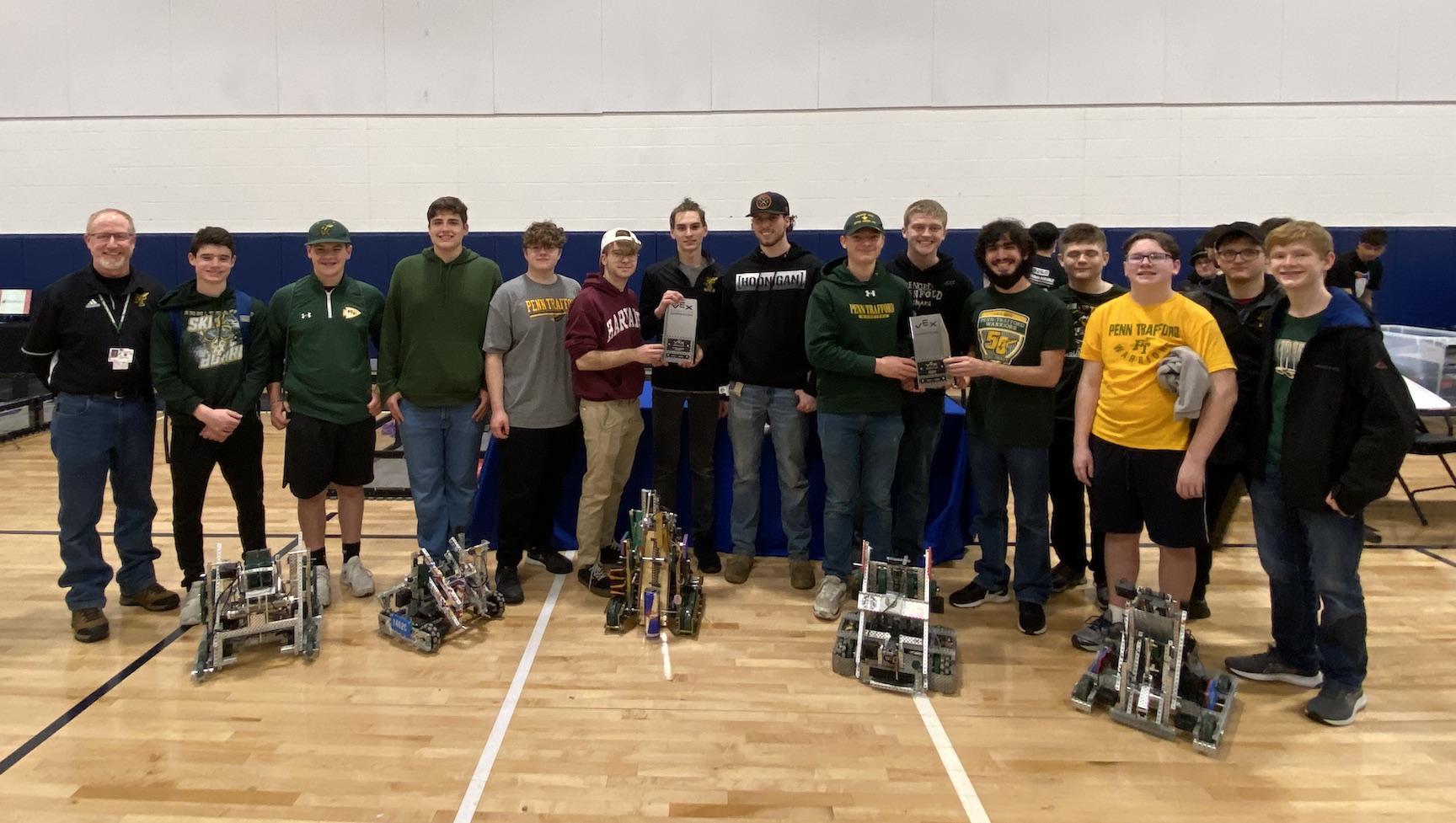 The five Penn-Trafford teams with their robots