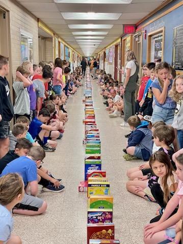students surround the cereal row