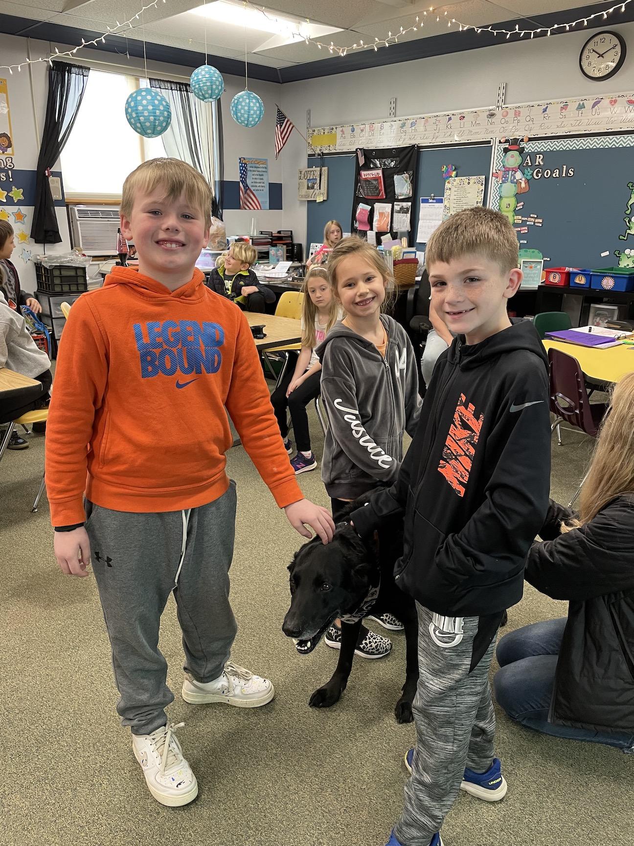 2nd-graders Matthew Evangeliste, Capriana Caruso, and Brody Fasso with Radar 