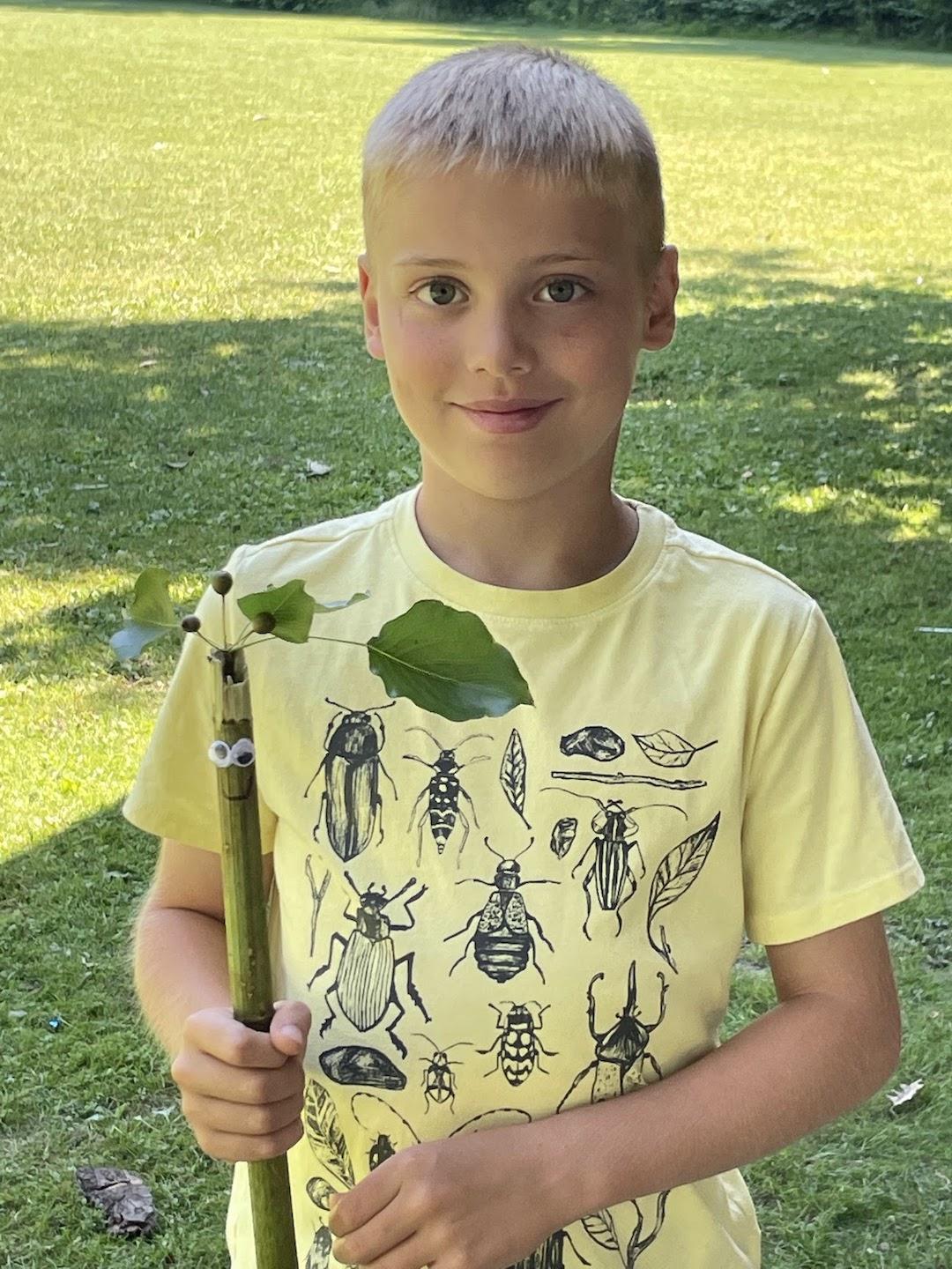 Connor Dickson with his ‘nature creature’ created from findings around the BY Park