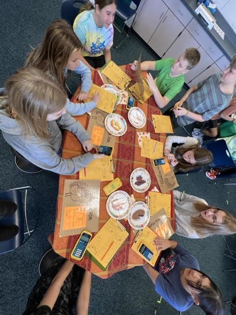 Students solve recipe problems for Thanksgiving dinner