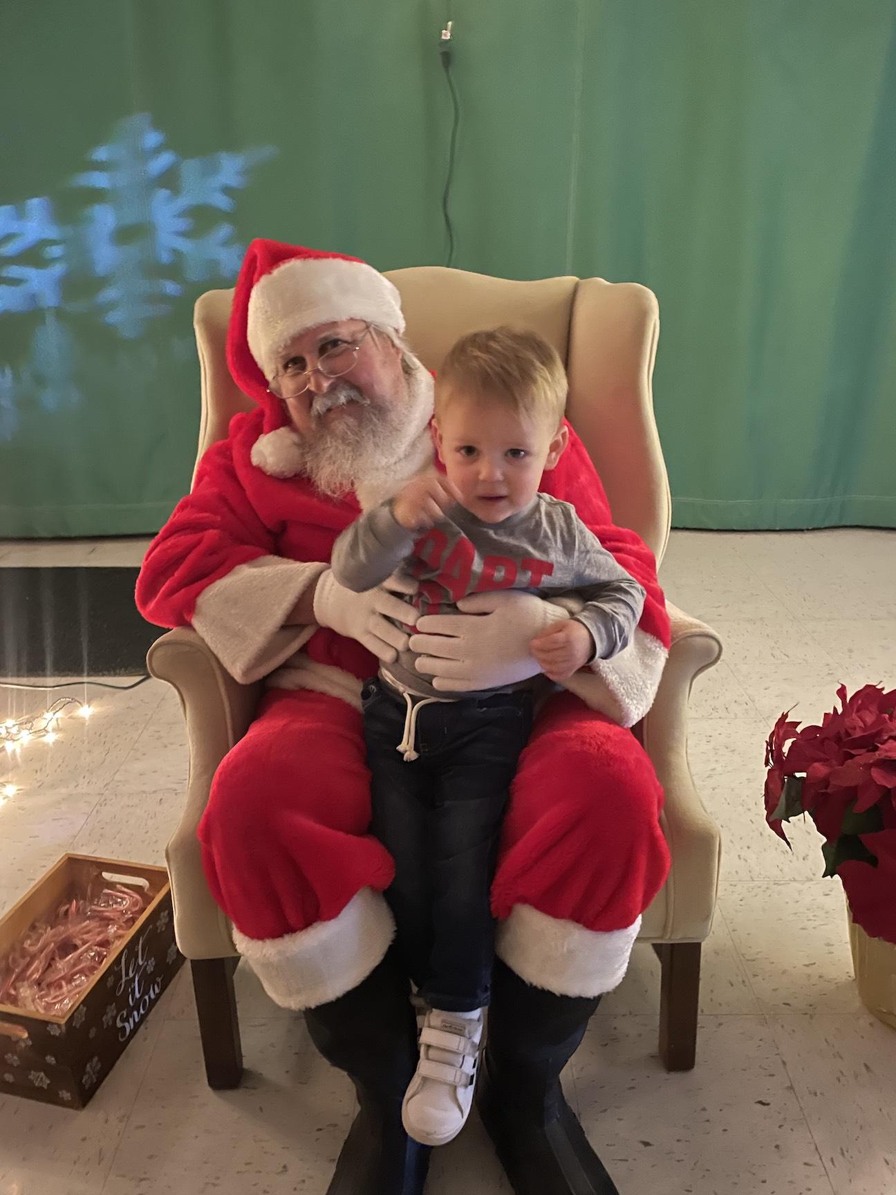 Carter Cerutti had a nice visit with special guest, Santa Claus