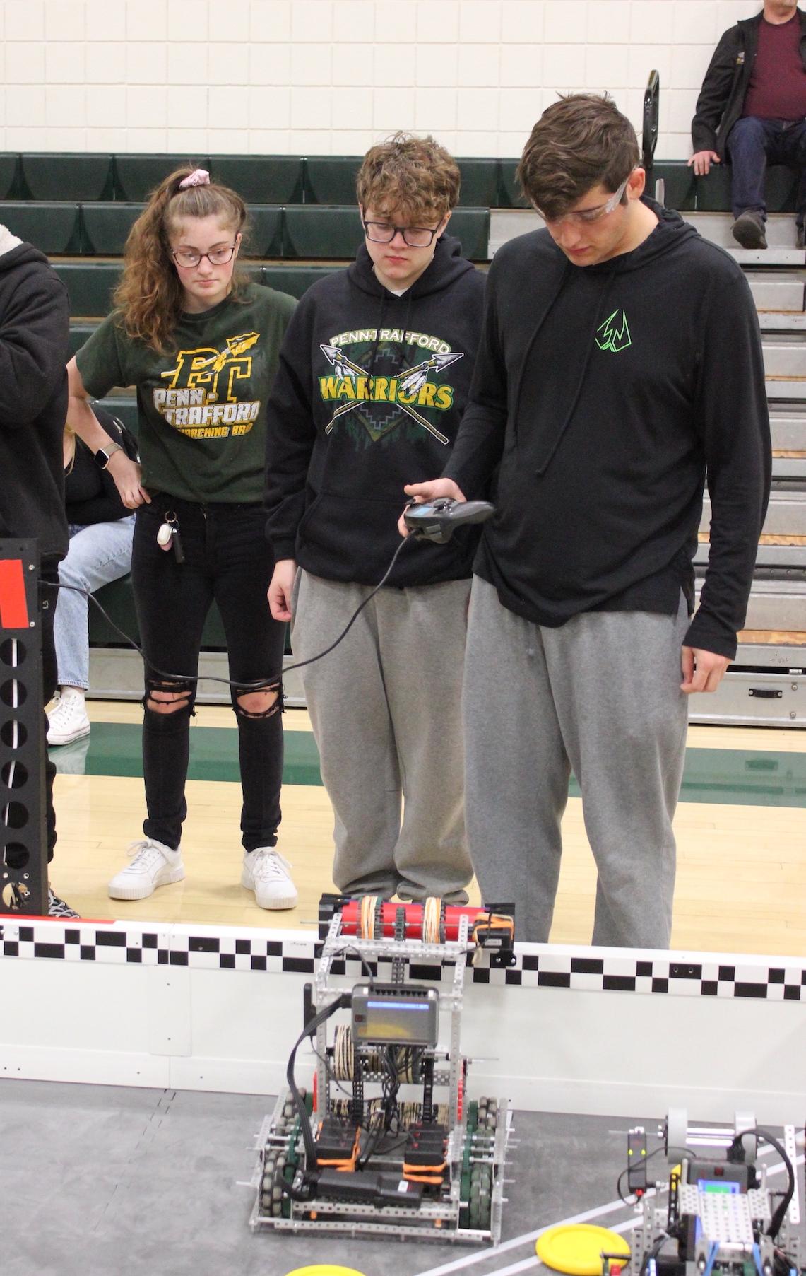 Penn-Trafford team #1462C was a tournament finalist:  (Left to right) Alivia Conrad, Ben Pratkanis, and Vince Patalski (missing from photo: Nicholas Yuhas)