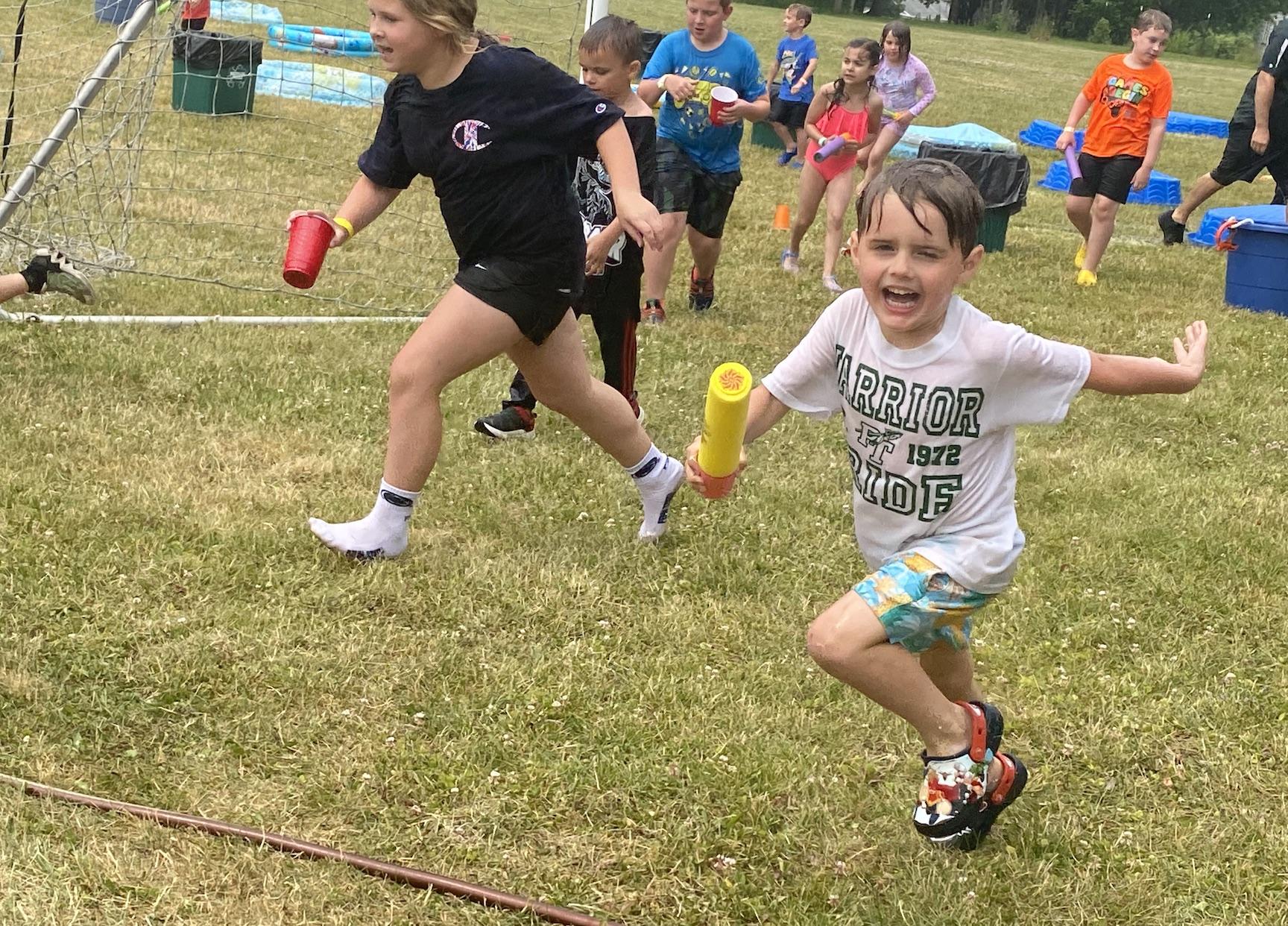 Rising kindergartener Jonah Dennison tries to outrun the water