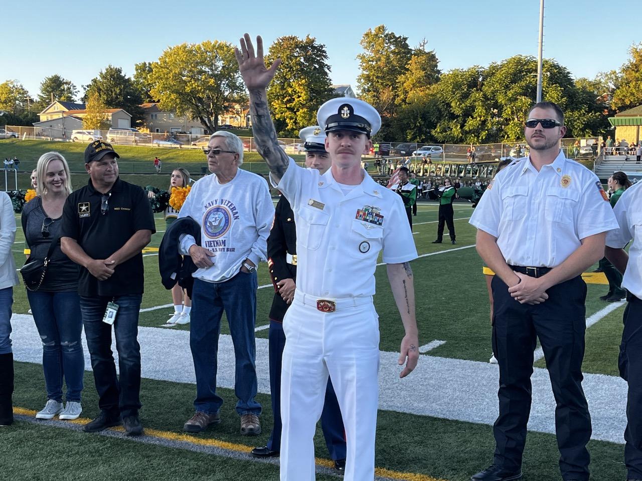 MMC(SW/AW) Adam Veitch stepped forward during the playing of the U.S. Navy anthem, ‘Anchors Aweigh’