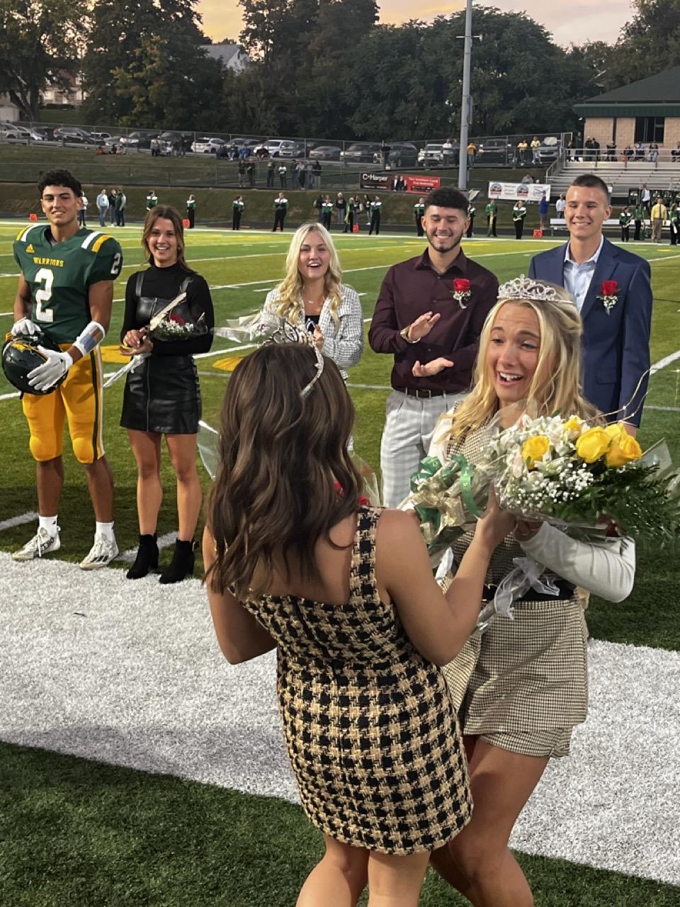 DeLaney Miklos is crowned 2023 Homecoming queen by last year’s queen, Carly Henderson