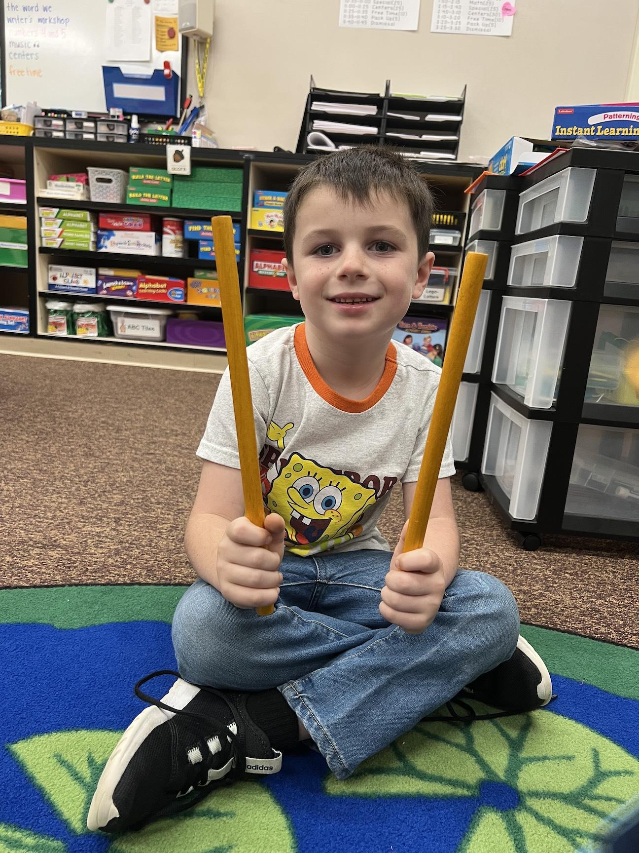 Kohen McDermott enjoyed the music lesson with his peers