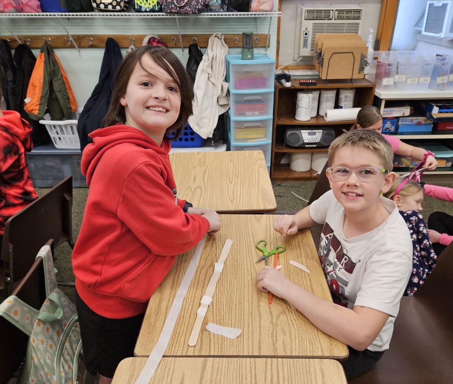 3rd-graders Griffin Mutzabaugh and Forrest Rasel designing their project 